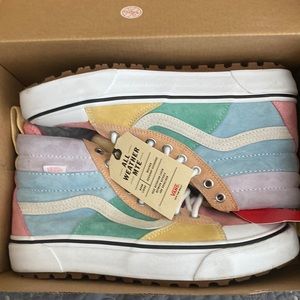 Hightop  pastel Vans with scotch guard size 7.5 men and 9.0 women.
